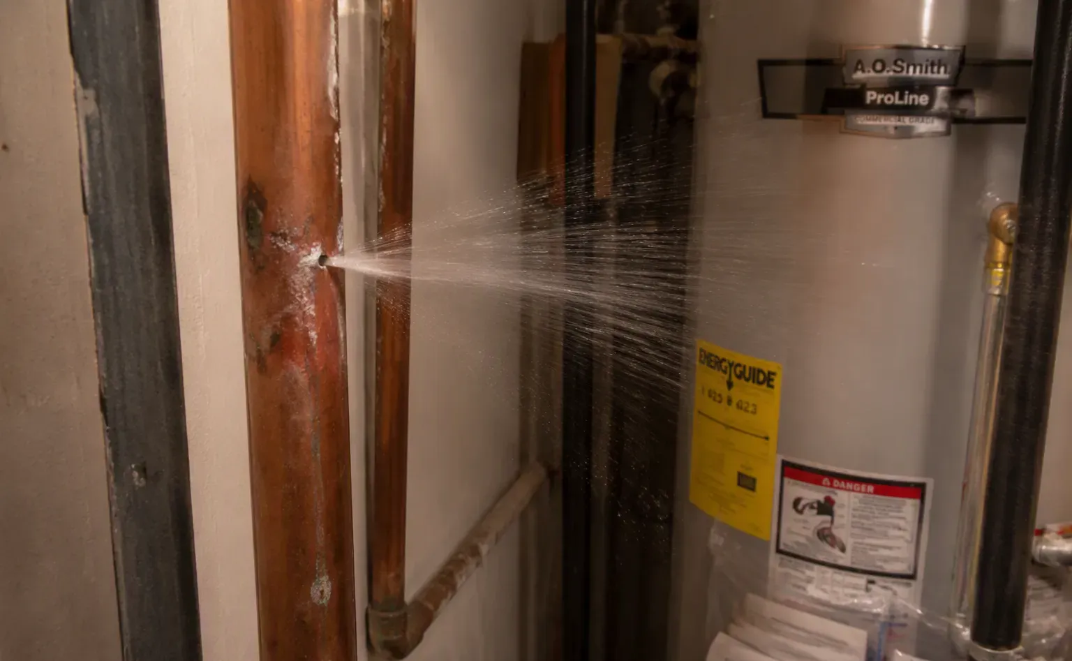Burst pipe repair and water cleanup in a Daytona Beach bathroom